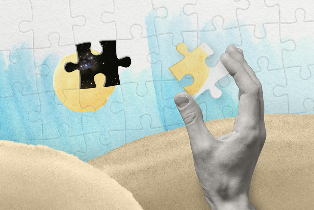 A large hand holding a puzzle piece that is missing from the sky. 